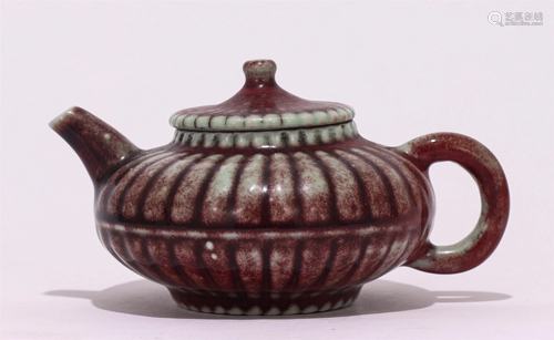 A CHINESE FLAMBE GLAZED PORCELAIN TEAPOT