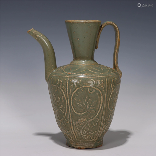 A CHINESE YUE TYPE GLAZED PORCELAIN HANDLED EWER