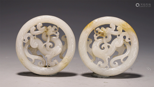 A PAIR OF CHINESE JADE PENDANTS