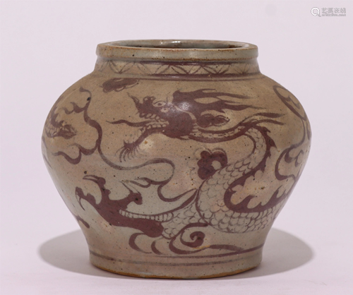 A CHINESE RED UNDER GLAZE PORCELAIN DRAGON PATTERN JAR