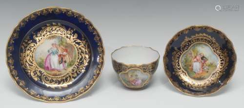 A German porcelain cabinet ogee-shaped teacup, saucer, and t...