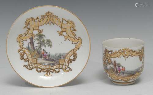 A Meissen bell-shaped coffee cup and saucer, well-painted wi...