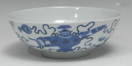 A Chinese circular bowl, painted in tones of underglaze blue...