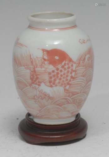 A Chinese ovoid miniature vase, painted in tones of pale red...