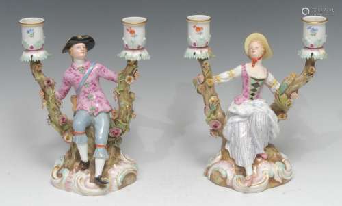 A pair of Meissen figural two-light candelabra, modelled as ...