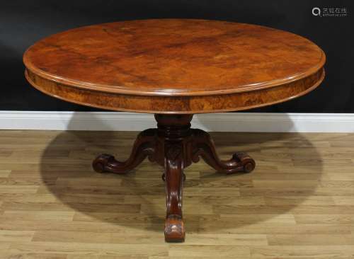 A Victorian walnut centre table, circular tilting top, turne...