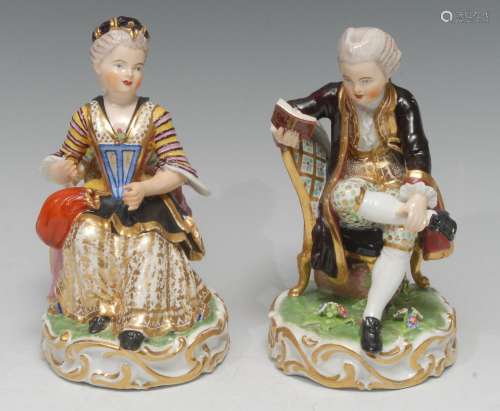 A pair of early 19th century Derby figures, Boy Reading a Bo...