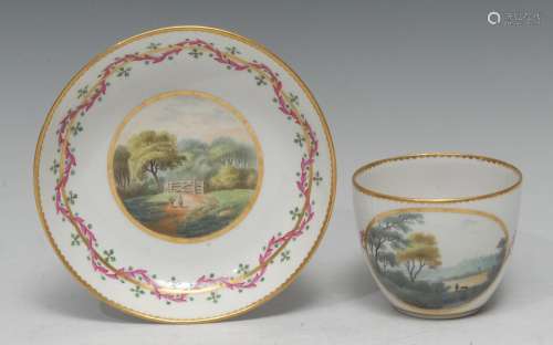 A Derby Named-View Bute-shaped tea cup and saucer, painted i...