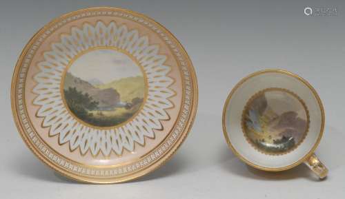 A Derby Named View Bute shaped teacup and saucer, painted by...