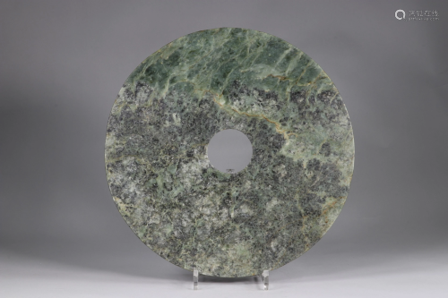 Disc, BI, in green-spinach jade, with some yellow-gold
