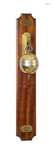A lacquered brass descending ball timepiece