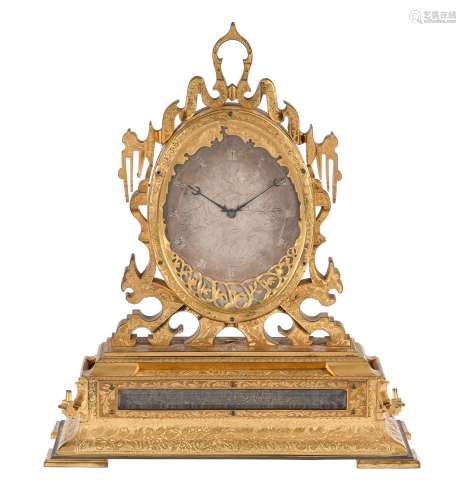 A fine Victorian engraved gilt brass mantel clock in the sty...