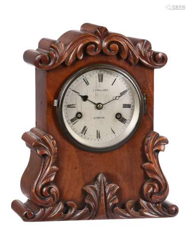 A Victorian carved mahogany small mantel clock