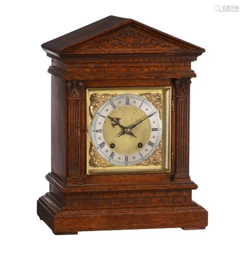 A German oak quarter-striking bracket clock