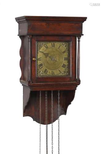 A George III stained pine hooded wall alarm timepiece
