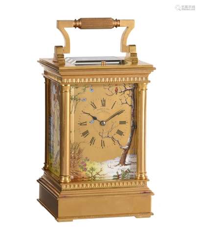 A fine French gilt brass carriage clock with painted porcela...