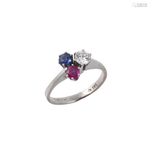 A diamond, sapphire and ruby three stone cluster ring