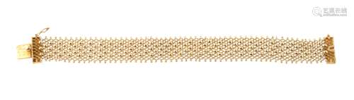 A Lebanese gold coloured woven bracelet