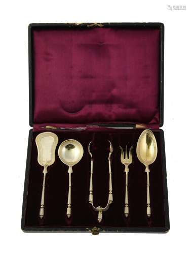 A French silver gilt serving set by Henin & Cie