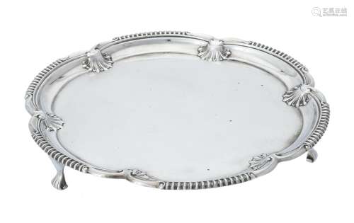 A silver shaped circular salver by Elkington & Co. Ltd.