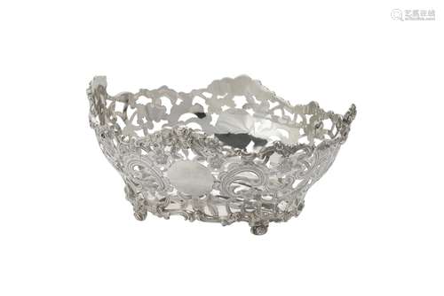 A silver oval pierced bowl by C. S. Harris & Sons Ltd.