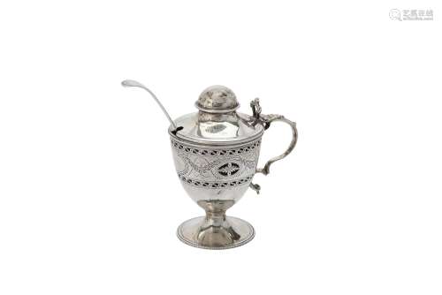 A George III silver urn shaped mustard pot by Richard Crossl...