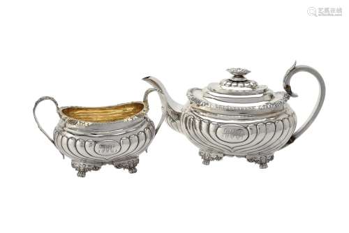 Y A late George III silver oblong baluster tea pot and sugar...