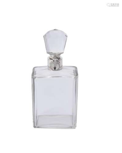 A silver mounted lockable glass decanter by Hukin & Heath Lt...