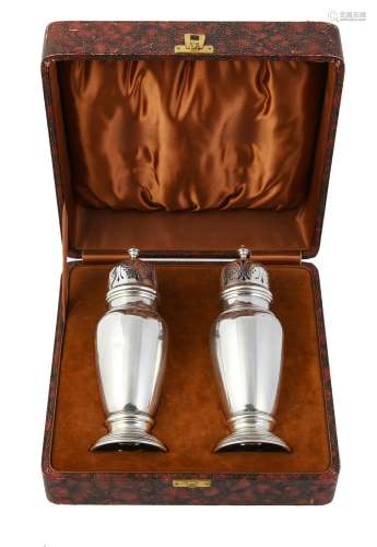 A cased pair of silver sugar casters by G. Bryan & Co.