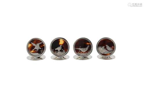 Y A set of four silver and tortoiseshell mounted menu holder...