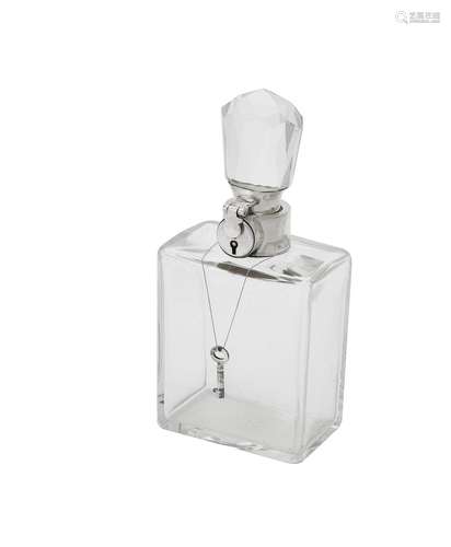 A silver mounted lockable glass decanter by Hukin & Heath Lt...