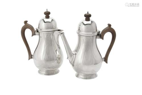 A silver baluster coffee pot and hot water jug by Blackmore ...