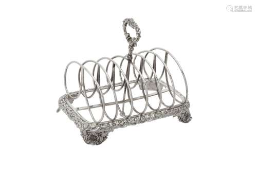 A George IV silver six division toast rack by Joseph Angell ...