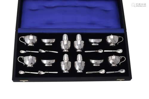 An assembled cased silver cruet set