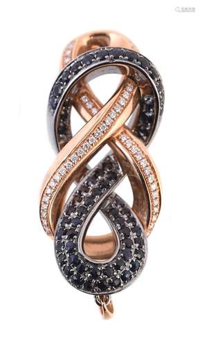 A diamond and sapphire knot pendant