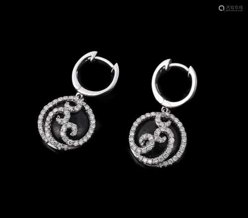 A pair of diamond and onyx ear pendants