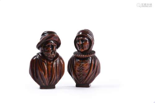 A pair of Flemish sculpted boxwood busts of a man and woman,...
