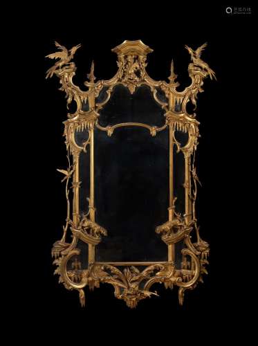 A carved giltwood and gesso wall mirror, in George II style,...