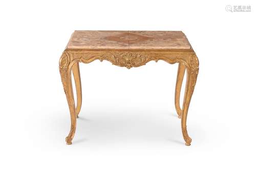 A giltwood and marble topped side table, in George II style,...