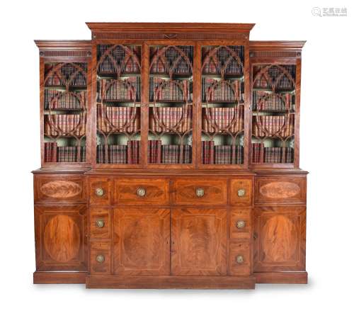 A George III mahogany and inlaid breakfront library bookcase
