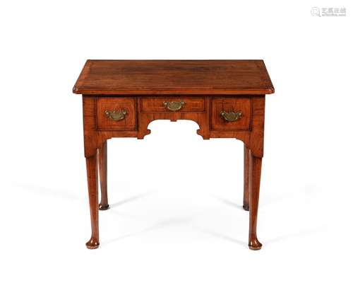 A George II walnut and crossbanded side table or lowboy, cir...