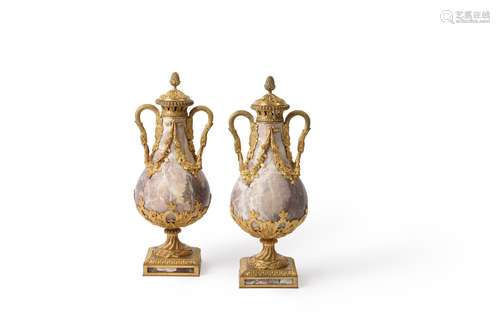 A pair of substantial French fleur de pecher marble and gilt...