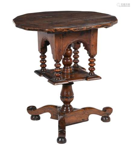 An elm 'revolving' table, circa 1700