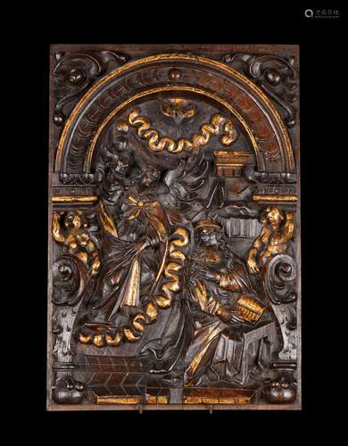 A set of three Flemish sculpted and parcel gilt oak Biblical...