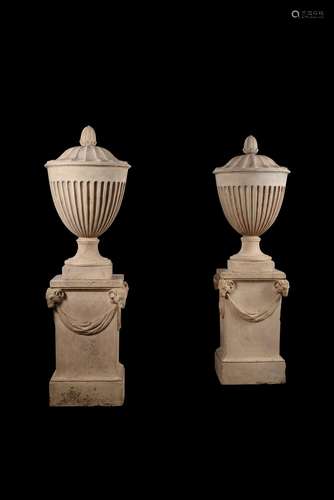 A pair of fine George III artificial 'Coade Stone' urn finia...