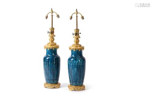 A pair of French ormolu mounted and turquoise glazed baluste...