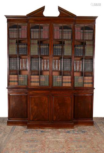 A George III mahogany breakfront secretaire library bookcase