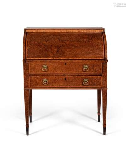 A George III burr yew and crossbanded cylinder bureau