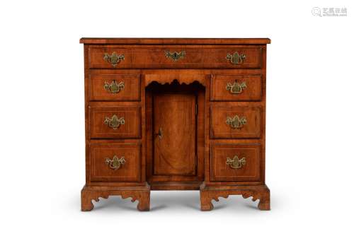 A walnut and line inlaid kneehole desk, mid 18th century