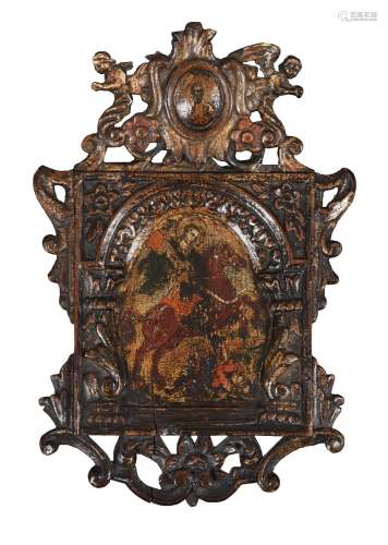 A Continental painted oak icon with St Dimitrios killing the...